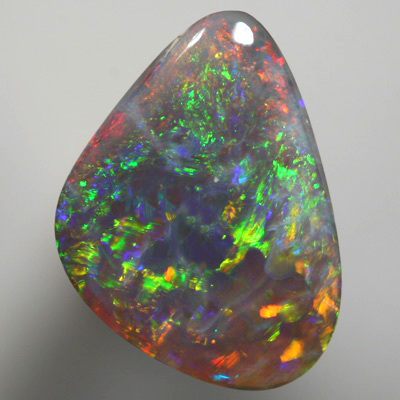 SOLID SEMI BLACK OPAL Sparkling red, orange and green 